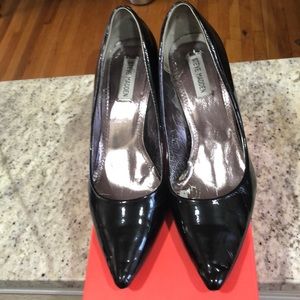 Black patent leather pumps